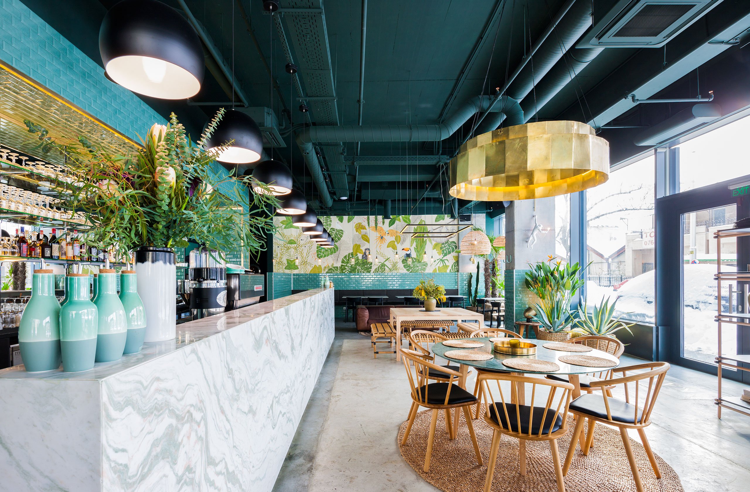 Industrial Style Restaurant with a Greenery-Themed Decor 1