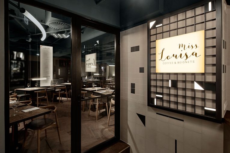 A Retro Style Café in Amsterdam Boasts a White Marble Bar and Exposed Pipes 10