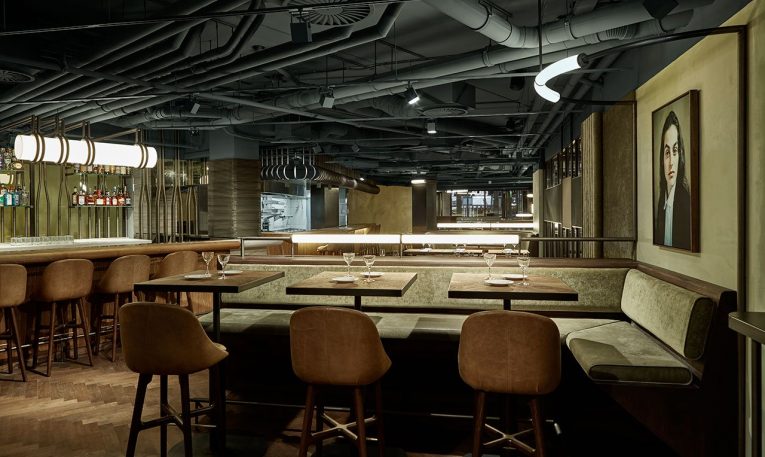 A Retro Café in Amsterdam Boasts a White Marble Bar and Exposed Pipes 4