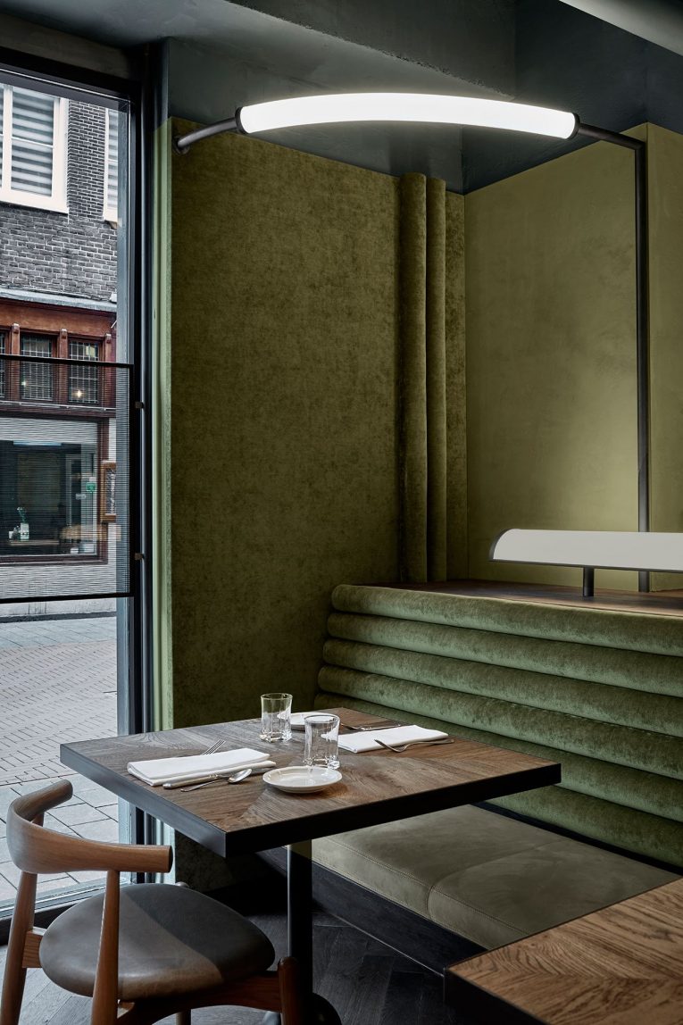 A Retro Café in Amsterdam Boasts a White Marble Bar and Exposed Pipes 4